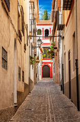 Narrow street in Granada, Spain