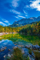 Fototapeta na wymiar A beautiful view at the colourful Frillensee in Germany, near Zugspitze, Alps, October 2018
