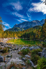 Fototapeta na wymiar A beautiful view at the colourful Frillensee in Germany, near Zugspitze, Alps, October 2018