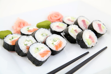 sushi set on white plate. Traditional japanese sushi rolls