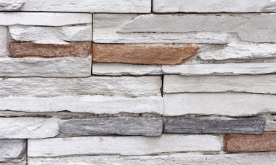 Board formed concrete texture. Stone wall background with colorful elements
