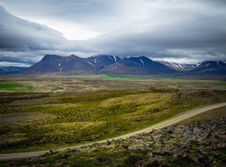 Gravel road in Icelandic landscape