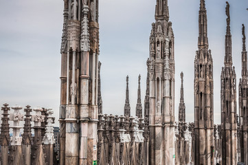 Fototapeta na wymiar Architectural details on Duomo Cathedral in Milan