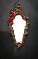 antique mirror on a black background