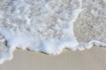 Ocean waves and sand