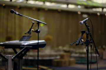 Microphone on a rack close-up.In the banquet room the microphone on a rack on the stage before the celebration