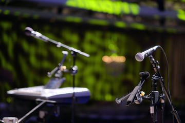 Microphone on a rack close-up.In the banquet room the microphone on a rack on the stage before the celebration