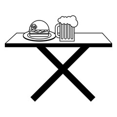 wooden table with beer glass and burger