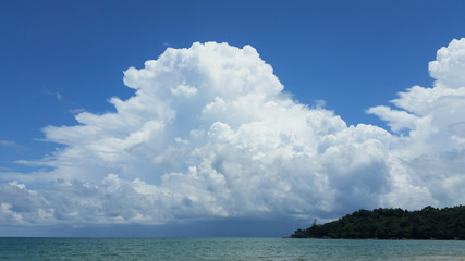 A big, white cloud on the blue sky