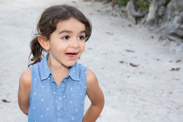 fun child girl outdoor in home garden alley