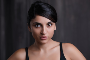 Fototapeta premium Brunette woman face, studio portrait