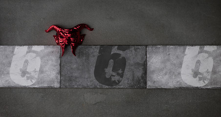 number 666 on a gray background