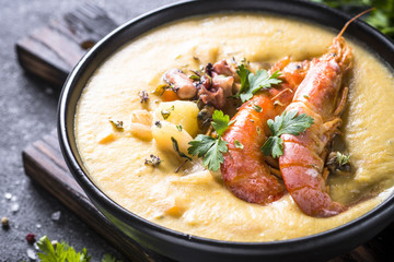 Chowder soup with seafood and prawn shrimps.