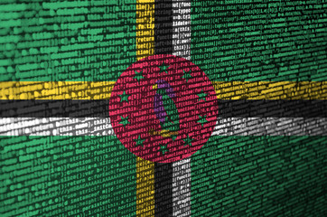 Dominica flag  is depicted on the screen with the program code. The concept of modern technology...