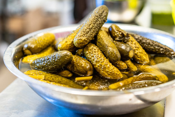 Stainless Steel Bowl with Pickled Cucumbers