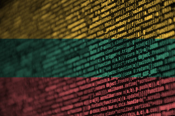 Lithuania flag  is depicted on the screen with the program code. The concept of modern technology...