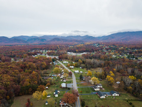 Aerial Of The Small Town Of Elkton, Virginia In The Shenandoah Valley With Mountains In The Distance