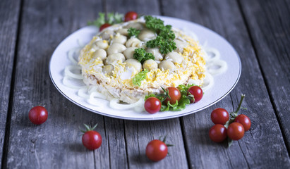 mushroom salad on wooden background
