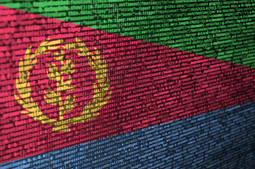 Eritrea flag  is depicted on the screen with the program code. The concept of modern technology and...