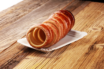 chimney cake. street food pastry with sugar for christmas.