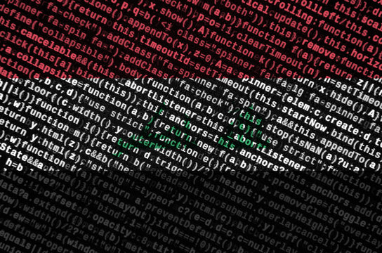Iraq flag  is depicted on the screen with the program code. The concept of modern technology and site development - Powered by Adobe