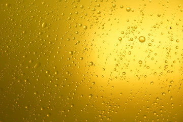 water drops autumn gold background setting sun