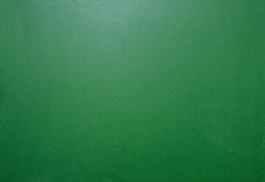 Empty green chalkboard texture and copy space