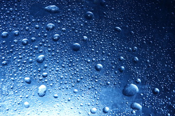 frozen water drops blue background