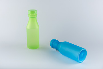 Two water bottles on white background