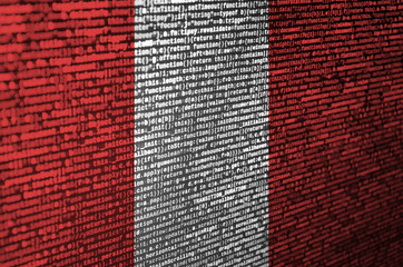 Peru flag  is depicted on the screen with the program code. The concept of modern technology and...