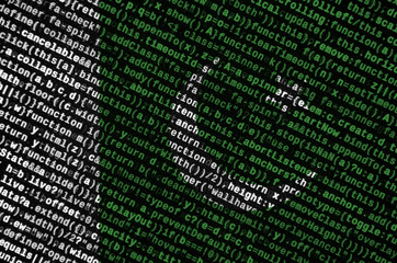 Pakistan flag  is depicted on the screen with the program code. The concept of modern technology...