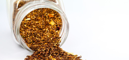 a jar of herbal tea falling of table