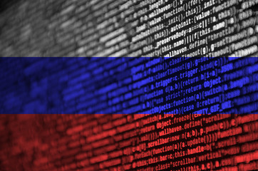 Russia flag  is depicted on the screen with the program code. The concept of modern technology and...
