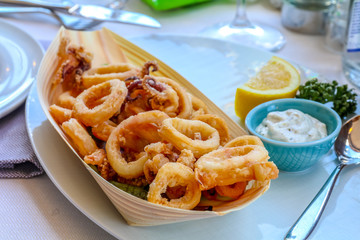 fried squid plate on a restaurant table