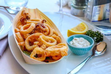 fried squid plate on a restaurant table