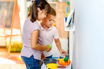 Preschool children playing. Role-Playing Activities for Kindergarten.