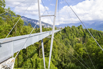 modern suspension bridge stretched between the mountains in Thun, Switzerland