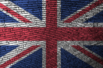 Great britain flag  is depicted on the screen with the program code. The concept of modern...