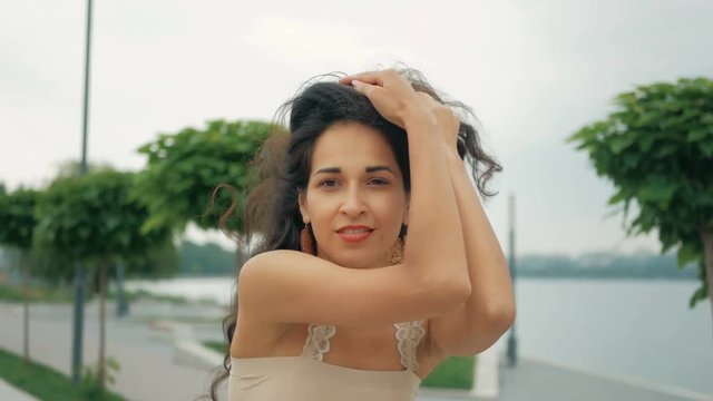 Beautiful woman dancer Kizomba and Bachata outdoors. mixed race woman