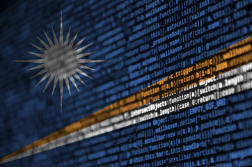 Marshall Islands flag  is depicted on the screen with the program code. The concept of modern...
