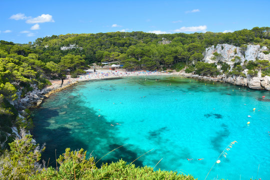 Turquoise water in bay Cala Macarella on Menorca