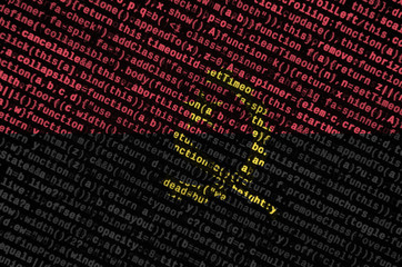Angola flag  is depicted on the screen with the program code. The concept of modern technology and...