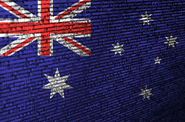 Australia flag  is depicted on the screen with the program code. The concept of modern technology...