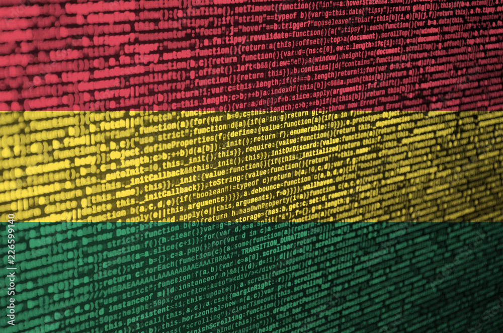 Wall mural bolivia flag is depicted on the screen with the program code. the concept of modern technology and s