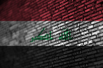 Iraq flag  is depicted on the screen with the program code. The concept of modern technology and site development