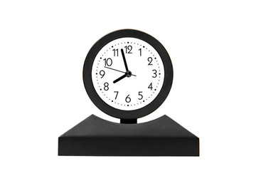 clock on a stand with a white dial on a white background. Isolatde on white