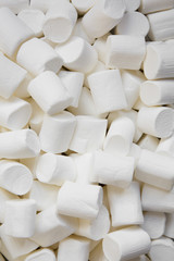 Closeup of white marshmallows. Top view, overhead, from above.