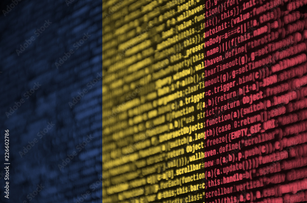 Wall mural romania flag is depicted on the screen with the program code. the concept of modern technology and s