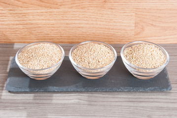 Grains of quinua on wood - Chenopodium quinoa
