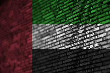 United Arab Emirates flag  is depicted on the screen with the program code. The concept of modern...